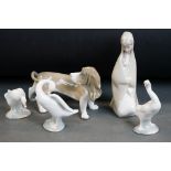 Five Lladro porcelain figures to include Bassett Hound, 20cm long, veiled mother carrying baby,