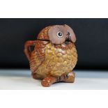 Novelty ceramic teapot & cover modelled as an owl perched on a branch, with textured feather