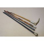 Three vintage military swagger sticks to include a Royal Artillery example with applied regimental