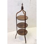 Early to Mid 20th century Mahogany Three Tier Circular Cake Stand with carved finial and shaped