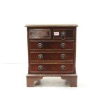 Small Chest of Drawers in the George III style with two short over three long drawers, drop ring