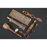 A group of treen collectables to include an antique mallet, chocolate mould, loving spoons and a