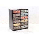 Contemporary Bank of Twelve Small Drawers with a patterned effect finish, 50cm wide x 59cm high