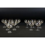 11 Babycham glasses to include six with leaping deer motif and five original glasses, 11cm high