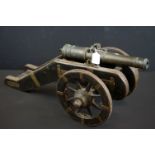 Late 19th / early 20th century signal cannon with a bronze barrel with twin dolphin handles, sat