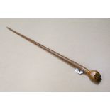Pitcairn Island Hardwood Walking Stick with the handle carved in the form of a clenched hand, 91.5cm