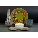 Six items of Poole Pottery to include a Delphis green-glazed shallow dish, 26.5cm diameter, a