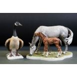 Goebel porcelain figure group of a grazing horse and foal, no. 3230318, dated 1974, 26.5cm long,