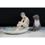 Bing and Grondahl porcelain figure modelled as a naked boy seated in a shell shaped pool, model