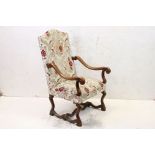19th century Open Armchair in the Carolean manner with upholstered seat and back, scrolling carved
