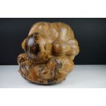 Carved Wooden Sculpture of a Seated Man with his head in his lap, 30cm high x 31cm wide