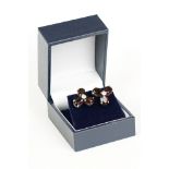 Cased pair of silver and garnet earrings