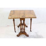 Victorian Burr Walnut and Ash Sutherland Table raised on ornately carved double column supports