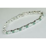 Silver, opal & emerald line bracelet