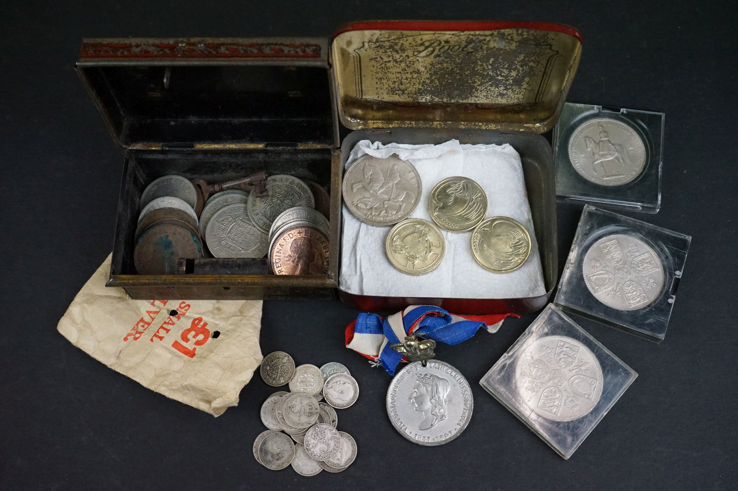A small collection of mainly British pre decimal coins together with three commemorative crowns