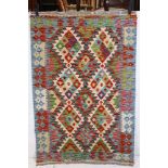 A hand knotted wool Choi Kilim runner, measures approx 125cm x 82cm.