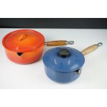 Two Le Creuset Lidded Saucepans, blue size 18 and orange size 20