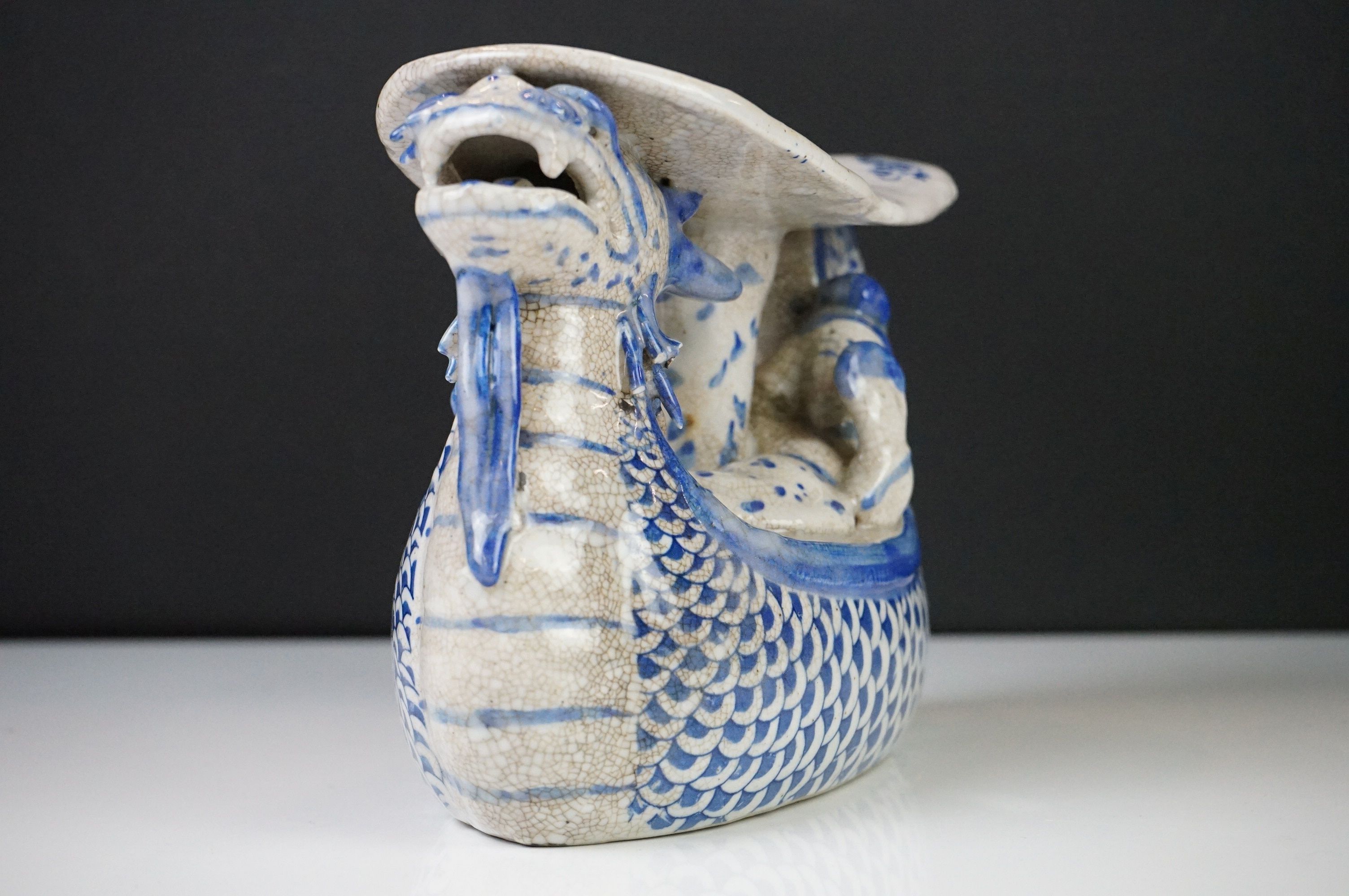 Chinese Blue and White Ceramic Head Rest in the form of a Dragon shaped Boat carrying figures, - Image 3 of 7
