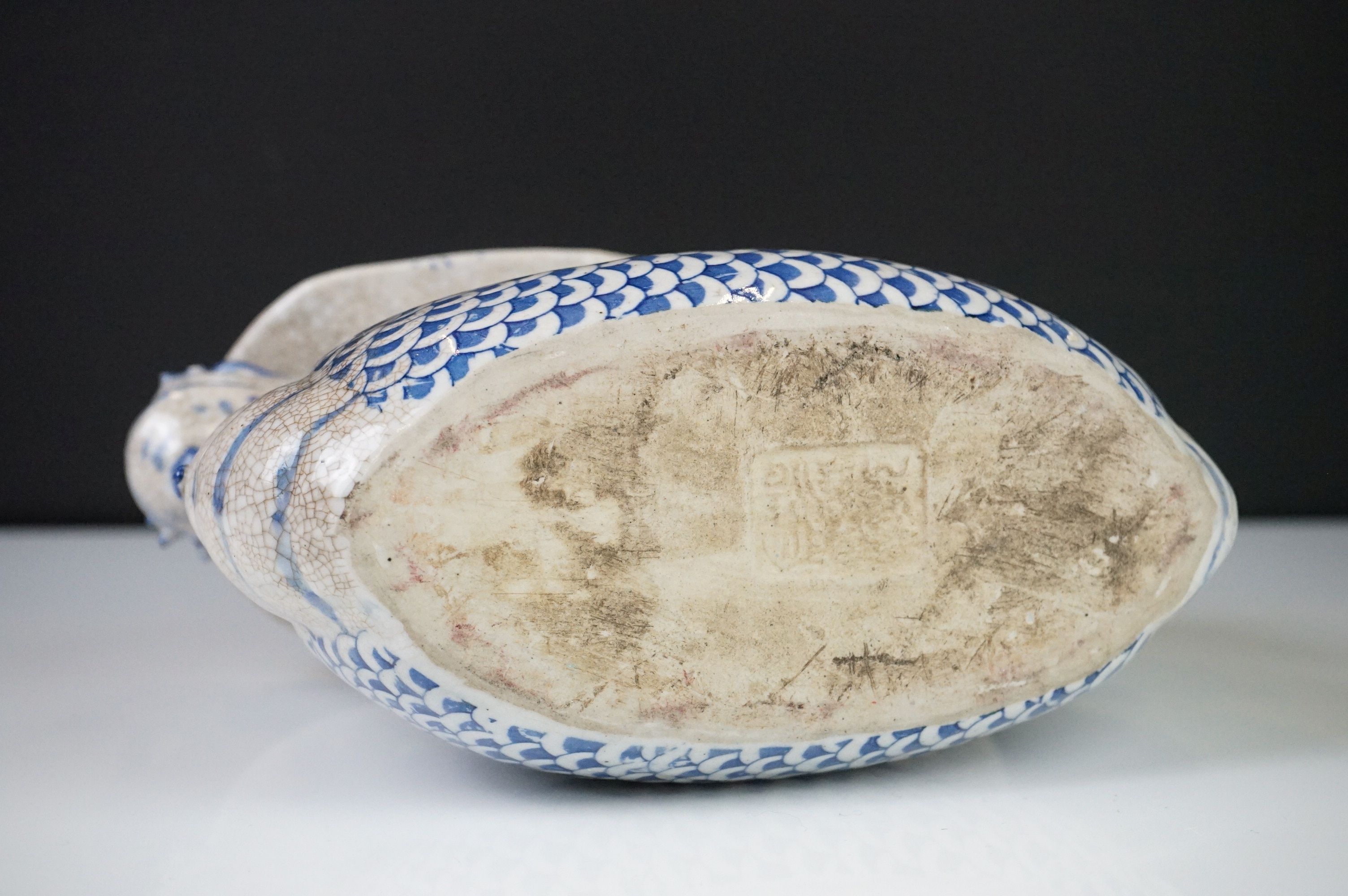 Chinese Blue and White Ceramic Head Rest in the form of a Dragon shaped Boat carrying figures, - Image 7 of 7