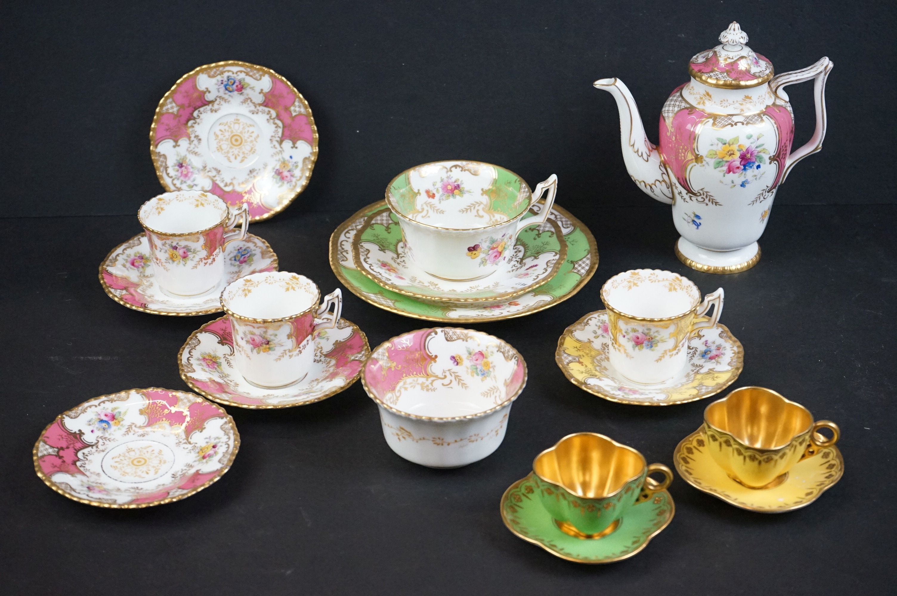 Early 20th century Coalport Cabinet part Coffee Set decorated in pink and gilt with floral sprays