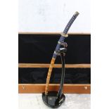 Replica Samurai Sword ' Sword of the Samurai ' with a black lacquered stand, contained in a fitted