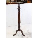 Victorian Mahogany Torchere / Plant Stand, the circular top above a turned fluted column and