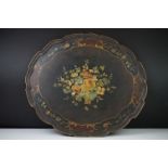 Black Lacquered Papier Mache Oval Tray with shaped edge decorated with flowers, 52cm long