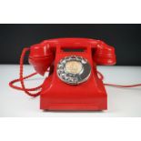 Mid 20th Century Chinese Red Bakelite 300 Series desk telephone, with alphabetical dial, the handset
