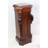 Victorian Mahogany Pillar Cabinet, the chamfered corners with carved column supports, 50cm wide x