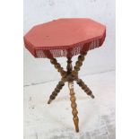 19th century Gypsy Table, the fabric covered octagonal top with fringe raised on a bobbin turned