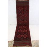 A hand knotted wool Meshwani runner, measures approx 250cm x 61cm