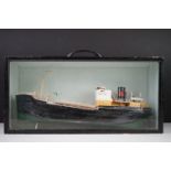 Mid 20th Century scratch-built painted wooden model of a cargo ship, housed within an ebonised