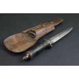 A World War One trench knife made from a damaged knuckle duster knife, original blade with skull