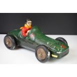 Ceramic model of a vintage Mercedes racing car with driver