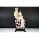 Mid century Czechoslovakian Hand painted Porcelain Model of a Pyjama Girl sat on an Oriental style