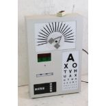 A opticians Lightbox with five test screens and remote control switch box.