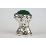 Silver corset style pincushion with emerald buttons