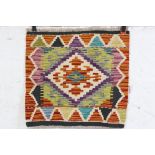 A hand knotted wool Chobi Kilim rug, measures approx 47cm x 50cm