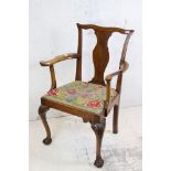 George II Walnut Elbow Chair with solid vase splat, upholstered drop in seat and carved cabriole