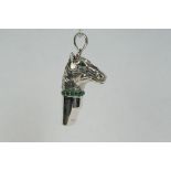 Silver horse whistle with emerald collar on silver chain