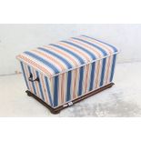 Victorian Box Ottoman raised on squat bun feet, contemporary upholstered in blue and red striped