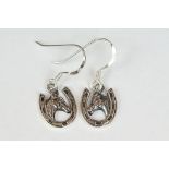 Pair of silver horseshoe earrings