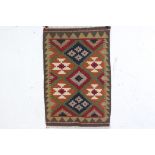 A hand knotted wool Maimana Kilim rug, measures approx 87cm x 58cm