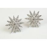 Pair of silver & CZ sunburst stud earrings