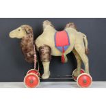 Early to Mid 20th century Steiff mohair camel on wheels, straw filled, glass eyes, standing on a