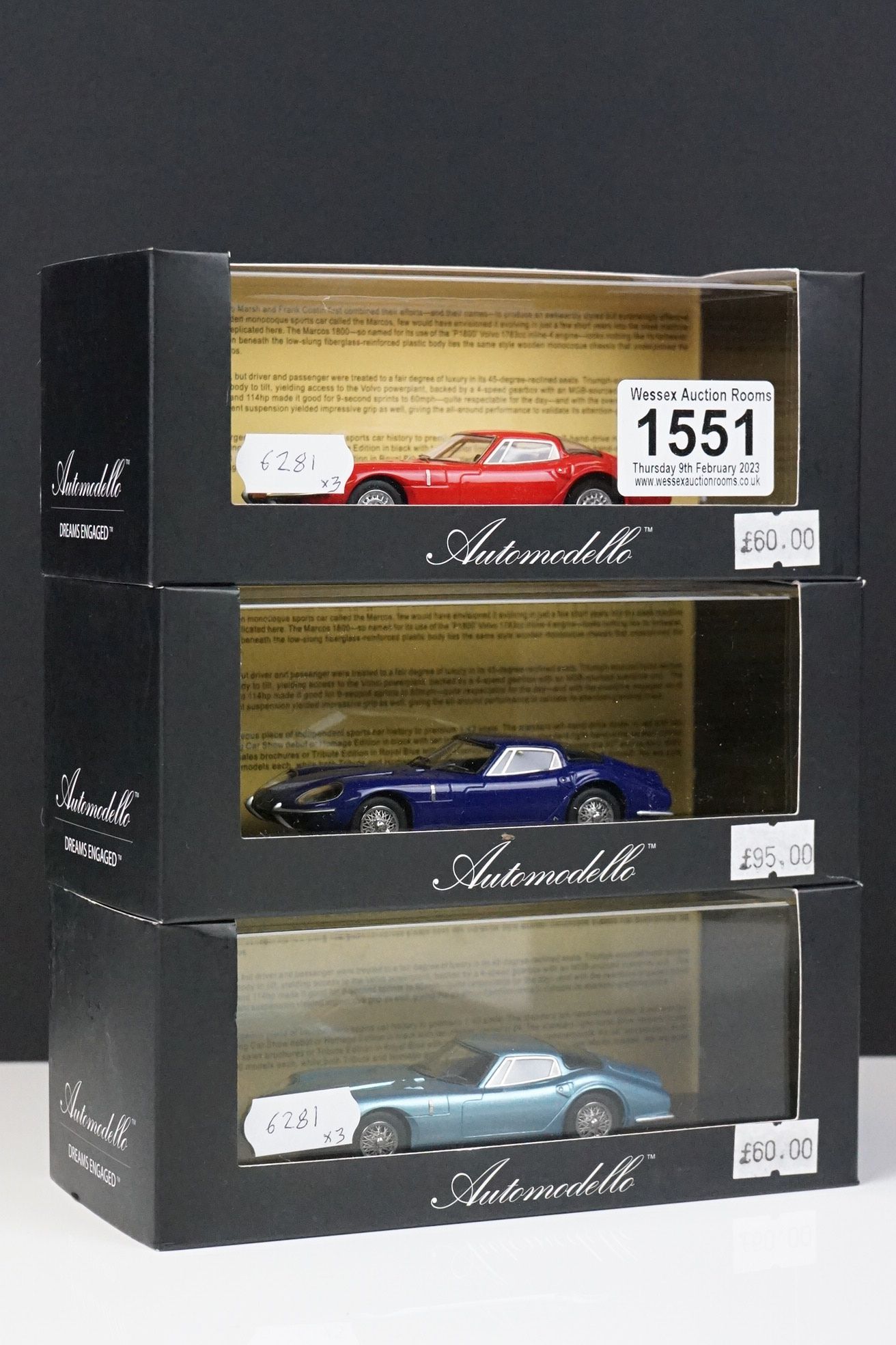 Three Boxed Automodello 1:43 1964 Marcos 1800 ltd edn models to include Tribute Edition Royal Blue