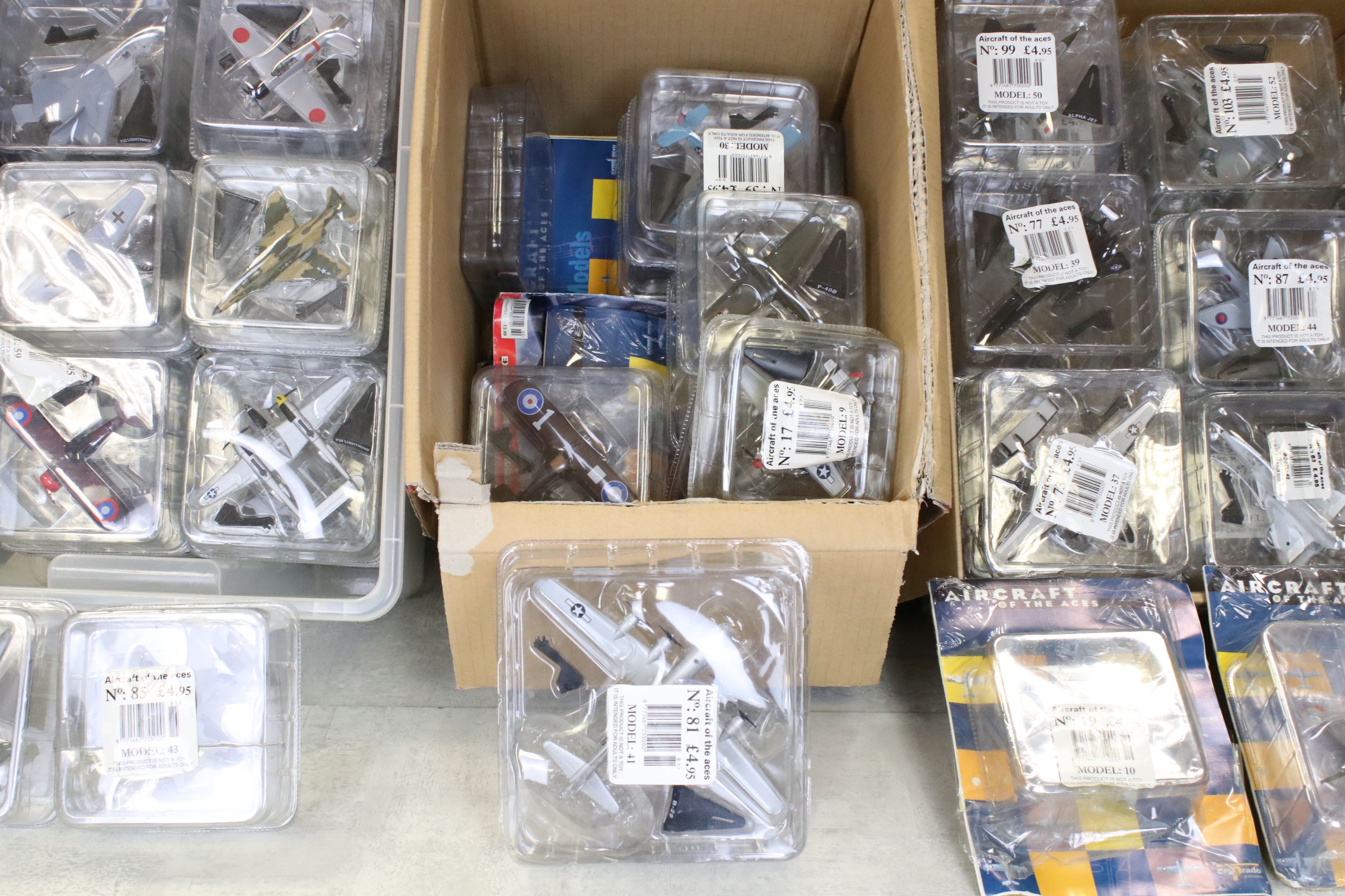 65 Cased Del Prado Aircraft of the Aces diecast plane models to include no. 19 MIG-29, no. 93 Bell