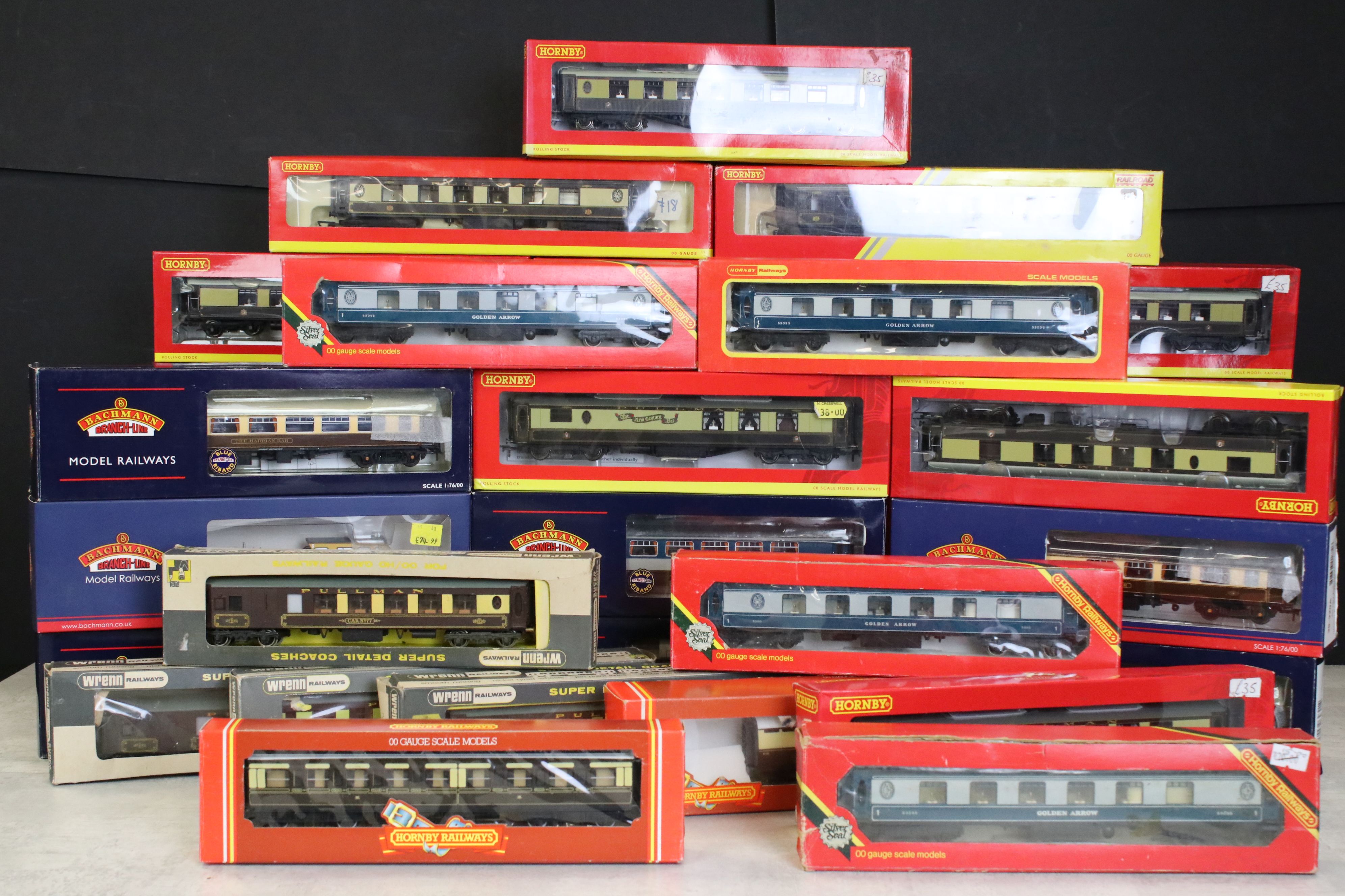 35 Boxed OO gauge items of rolling stock to include 24 x Hornby, 7 x Bachmann & 4 x Wrenn,