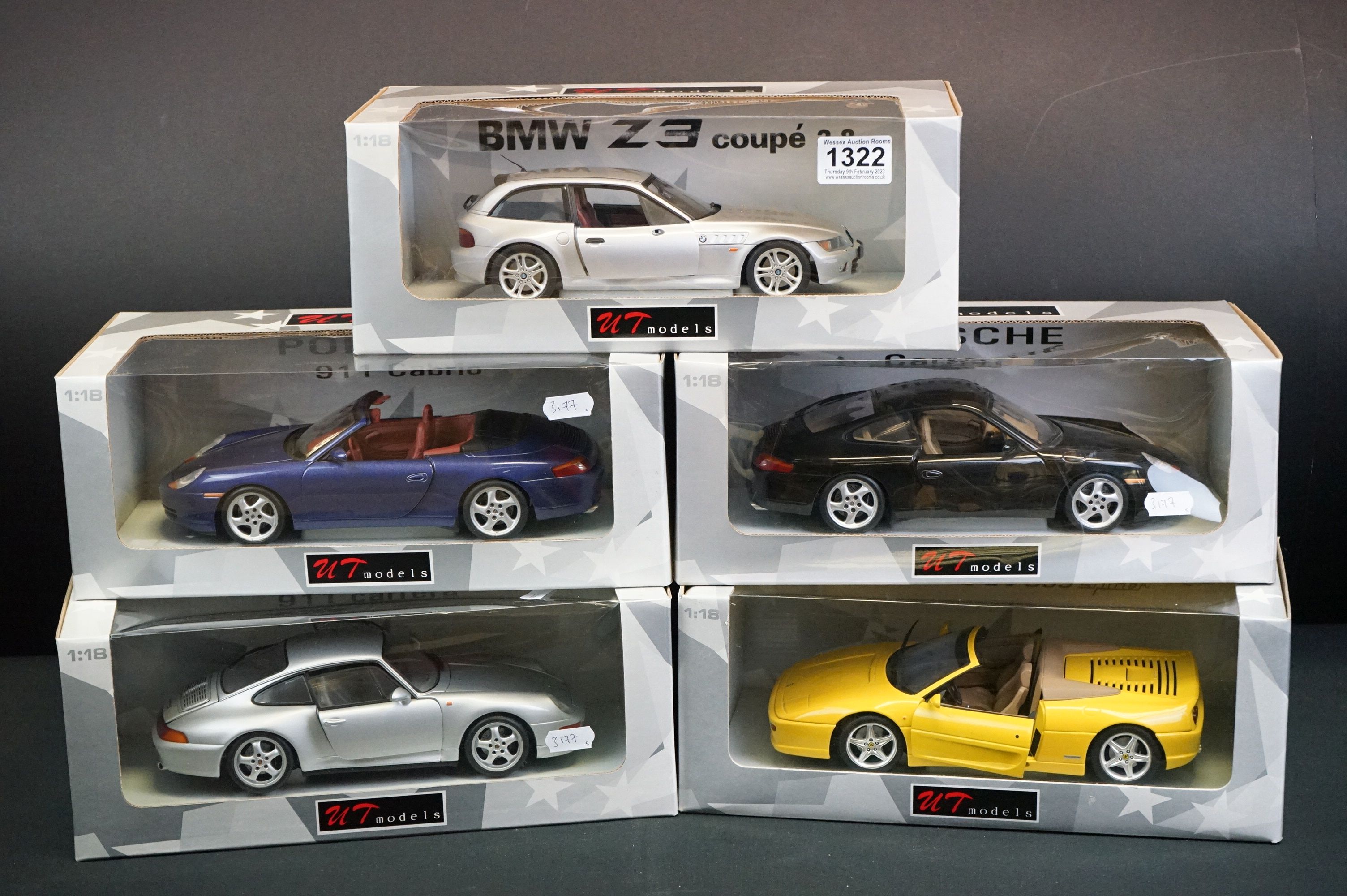 Five boxed 1/18 UT Models diecast models to include Porsche 911 Cabrio, Ferrari F355 Spider, Porsche