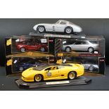 Four boxed Maisto 1/18 diecast models to include 3 x Premiere Edition (2 x Mercedes Benz SL Class,
